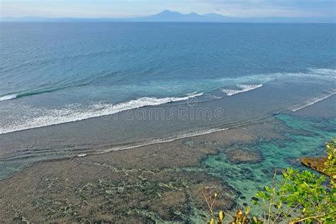 Beautiful Coastline With Volcanic Mountains At The Background Bali