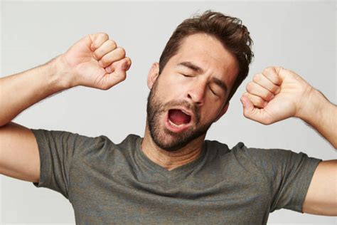 660 Sleepy Man Yawning Stretching Stock Photos Pictures And Royalty