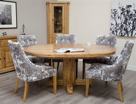 The telescopic action opens to incorporate two large leaves. Deluxe Oak Round Extending Dining Table - Freitaslaf Net ...
