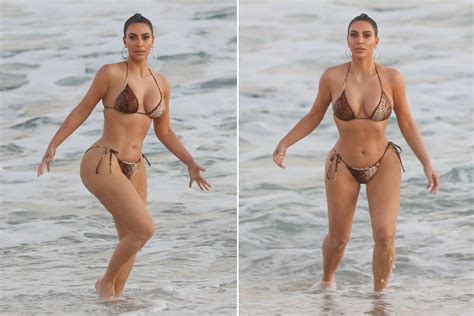 Kim Kardashian Poses On The Beach In Skimpy Bikini