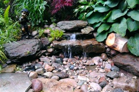23 Absolutely Gorgeous Pondless Disappearing Waterfall Designs For Your