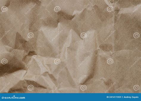 The Texture Of Crumpled Craft Paper Background Close Up Stock Image