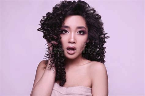 It's a much longer video than normal. Sensual Beautiful Asian Girl With Curly Hair-style Stock ...
