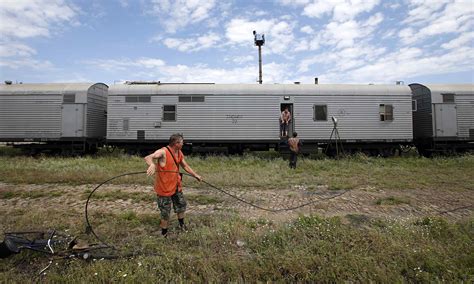 mh17 victims put on refrigerated train bound for unknown destination world news the guardian