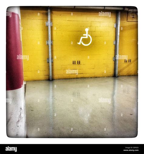 Disabled Parking Space In Parking Garage Stock Photo Alamy