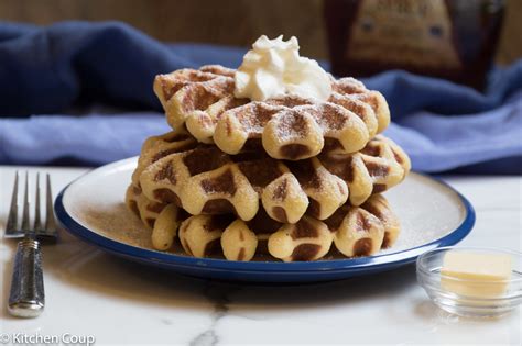 Belgian waffles are yeasted waffles made in waffle irons with big, deep pockets. Omama's Belgian Waffles - Kitchen Coup