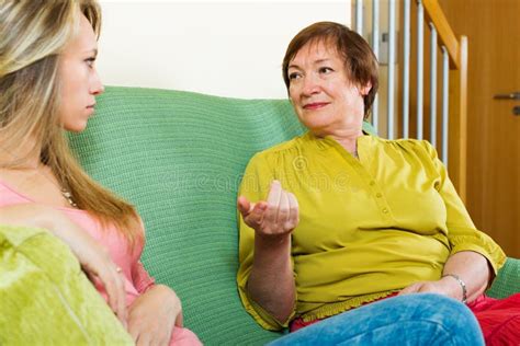 serious mature mother and daughter talking stock image image of girl lifestyle 51416269