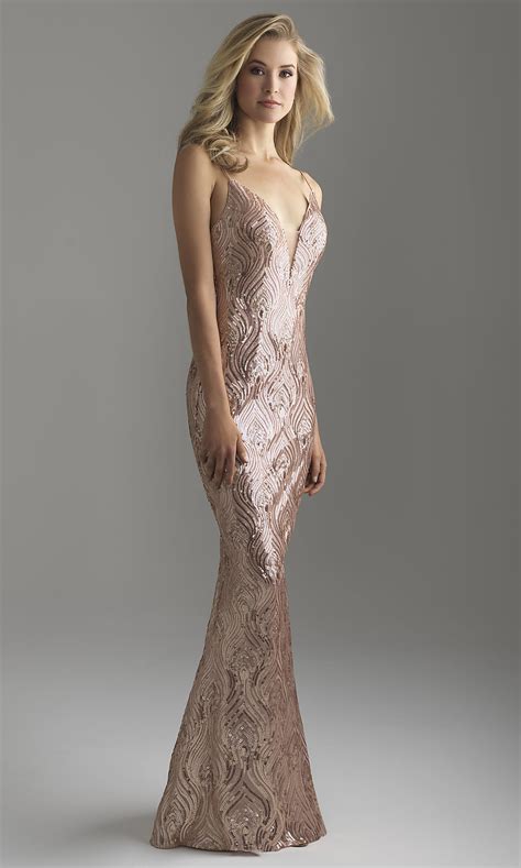 Featuring an intricate sequin design on a mesh fabric you are sure to sparkle out from the crowd. Rose Gold Long Sequin Prom Dress - PromGirl
