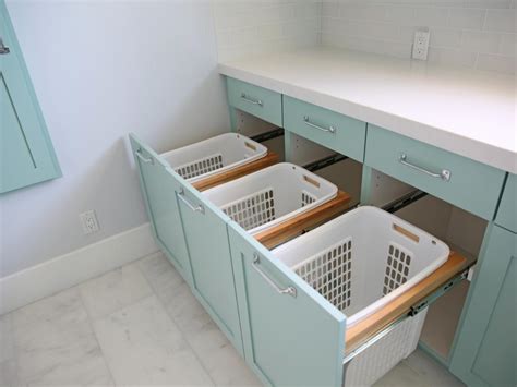Laundry chute laundry chute behind a large cabinet door hides a giant laundry bin which gets fed by the master bedroom laundry chute above laundry chute cabinet. Small Laundry Room Storage Tips