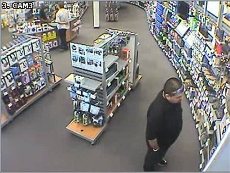 Surveillance Footage Catches Radioshack Shoplifter Shoving Dash Cam