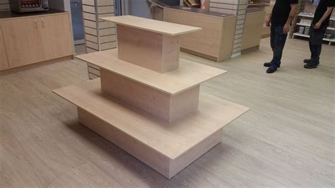 A Tiered Island Unit Perfect For The Center Of Your Retail Display