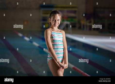 Smiling Young Girl In Indoor Swimming Pool Stock Photo Alamy