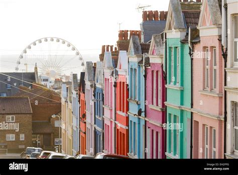 Row Of Colourful Painted Terraced Houses In Brighton East Sussex Stock