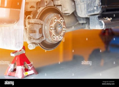 Close up Car brake part at garage, Old and dirty rear dump break of the