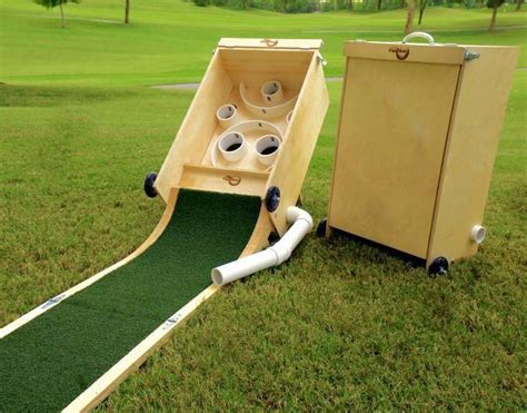 The skee ball machine is a wonderful thing. Diy skee ball | Diy yard games, Backyard games, Wood games