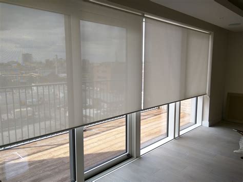 Sliding glass door blinds ideas. Sunscreen roller blinds - floor to ceiling windows ...