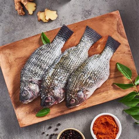 Buy Fresho Tilapia Fish Whole Cut Cleaned Flavourful Online At Best