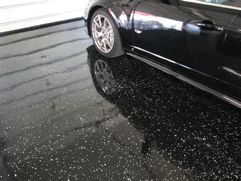 Adding an epoxy paint to your concrete floor can give it a unique, beautiful, brand new look! NH Garage Floor Paint Coating MA ME Epoxy Concrete Flake