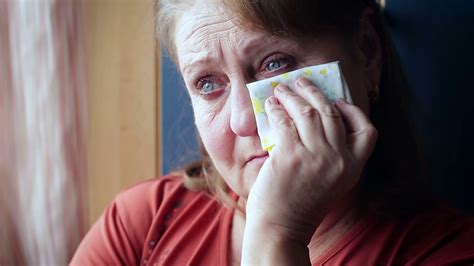 Elderly Woman Crying Wiping Her Tears With A Handkerchief Stock Video
