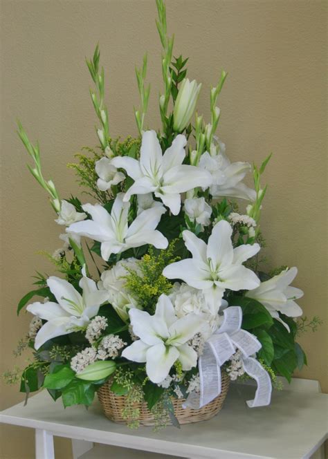 An All White Flower Arrangement Including White Lilies Made By Your