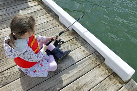 Young Girl Fishing With A Fishing Rod Stock Image Image Of Lifestyle