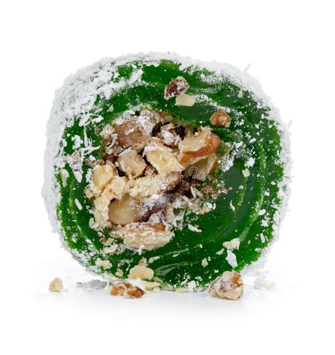 Green Turkish Delight With Nuts On Powdered Sugar Isolated On White