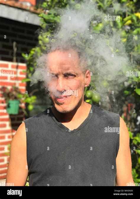 Portrait Man Smoking Hi Res Stock Photography And Images Alamy