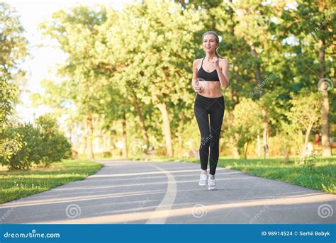 Female Runner Jogging In The Forest Stock Photo Image Of Motivation