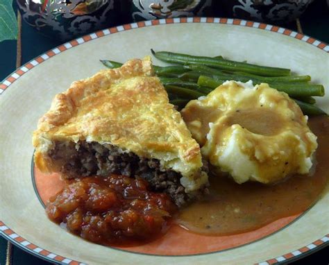 A folk arts display and explanation of the 12 meatless dishes we see at the ukrainian christmas eve supper table.made for the 47th pysanka festival. French-Canadian Christmas Eve tradition -Tourtiere. ~ | French christmas food, Dinner, Christmas ...
