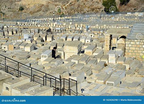 An Orthodox Walking Around Mount Of Olives Jewish Cemetery Editorial