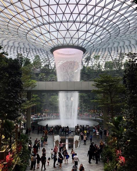 A luscious garden will be encased. World's tallest indoor waterfall at Singapore's newest ...