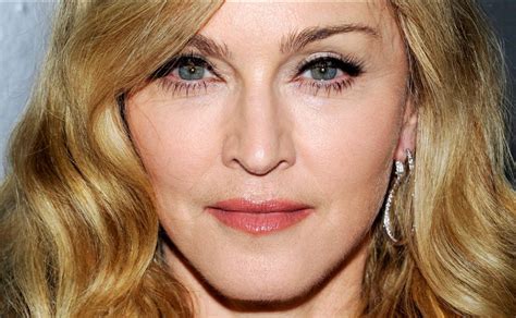 Madonna Goes Topless At Covers Herself With Hair