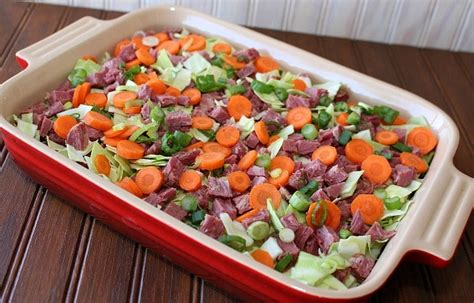 Canned corned beef is combined with macaroni, cheese, cream of chicken soup, and vegetables. Corned Beef and Cabbage Casserole with a Hash Brown Crust