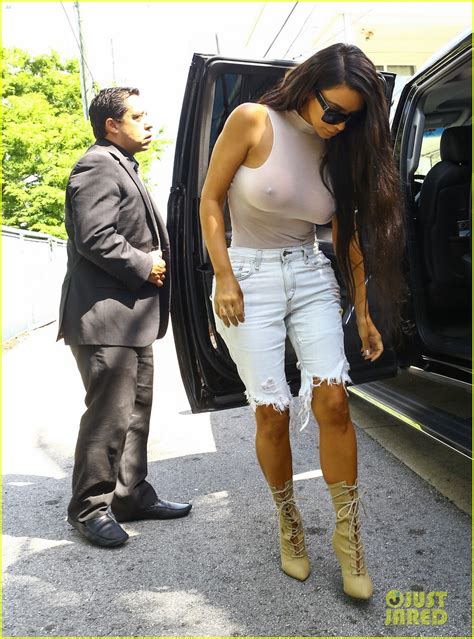 Photo Kim Kardashian Goes Braless While Wearing See Through Top