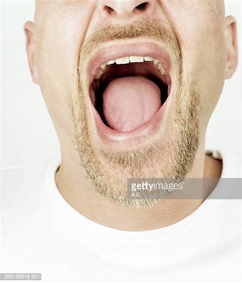 Man With Mouth Wide Open Close Up Photos And Premium High Res Pictures