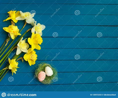 Easter Daffodils And Eggs With Old Wooden Background Stock Image