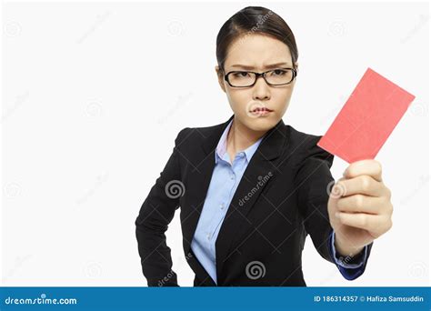 Angry Businesswoman Holding Up A Red Card Stock Image Image Of Side