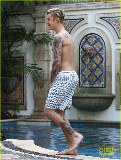 Full Sized Photo Of Justin Bieber Goes Shirtless For Swim At Versace