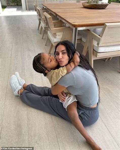 Kim Kardashian Shares Series Of Sweet Snaps As She Cuddles Son Saint Five Daily Mail Online