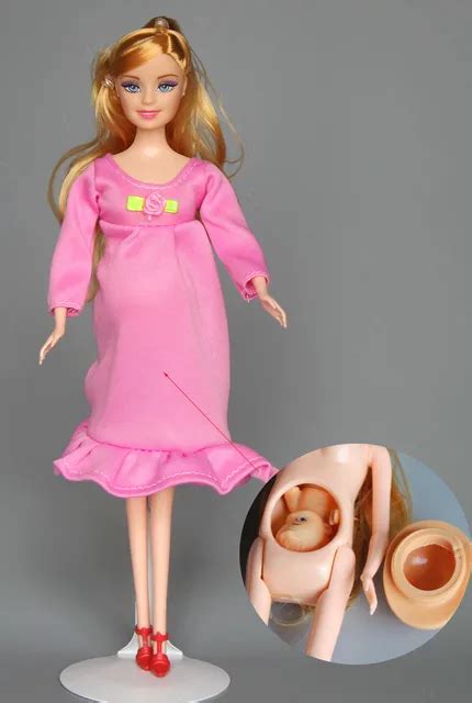 Muñeca embarazada con vestido rosa Zapatos muñeca tiene un bebé en la