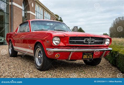 Front View Of Classic Car Ford Mustang First Generation In Red Color