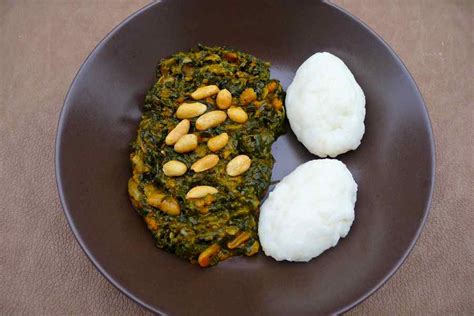 Nsima With Pumpkin Leaves Tomato And Ground Nuts Zambia Africa