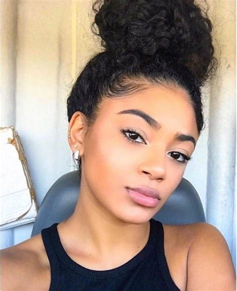 20 Amazing Curly Bun Hairstyles To Stand Out 2023 Trends