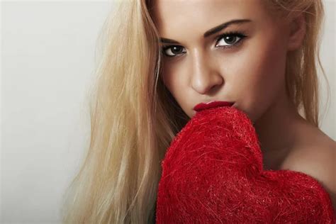 Sexy Beautiful Blond Woman With Red Heart Beauty Girl Show Love Symbol Valentines Day