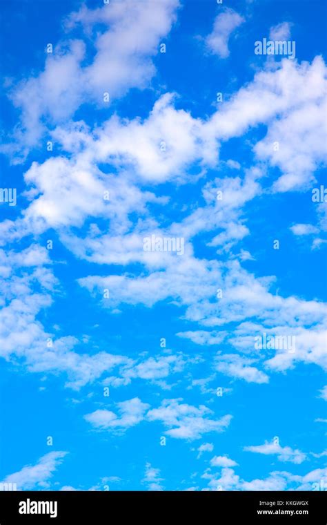 Blue Sky With Light Clouds Background Vertical Composition Stock