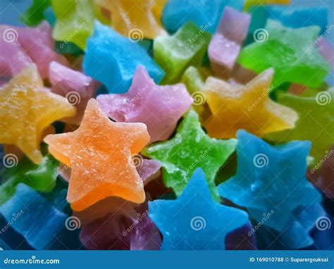 Close Up Orange Star Candy On Pile Of Star Candies Stock Photo Image