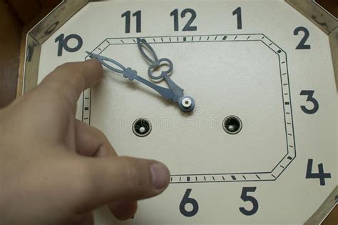 Move The Hands Of A Large Mechanical Clock By Hand Stock Image Image