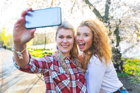 Two Women Taking A Selfie At Park In London Stock Photo 34926