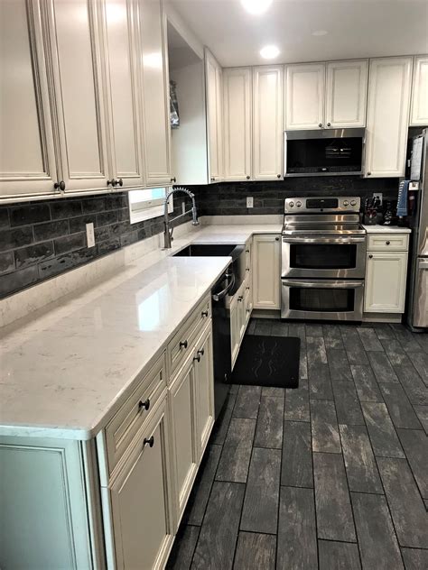 For these reasons and more, glass tiles are a perfect choice for kitchen backsplashes, shower walls, tub surrounds, and accent walls. Kitchen | Quartz kitchen countertops, Quartz kitchen ...