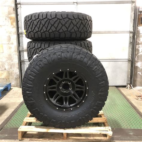 Pro Comp Series 05 Wheel And Tire Package With Nitto Ridge Grappler Tires